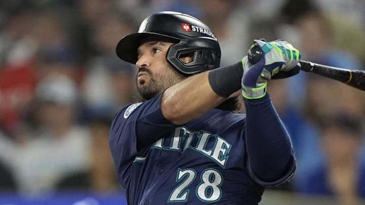 Oct 20, 2025; Toronto, Ontario, CAN; Seattle Mariners third baseman Eugenio Suarez (28) hits a single against the Toronto Blue Jays in the second inning during game seven of the ALCS round for the 2025 MLB playoffs at Rogers Centre. Mandatory Credit: John E. Sokolowski-Imagn Images Oct 20, 2025; Toronto, Ontario, CAN; Seattle Mariners third baseman Eugenio Suarez (28) hits a single against the Toronto Blue Jays in the second inning during game seven of the ALCS round for the 2025 MLB playoffs at Rogers Centre. Mandatory Credit: John E. Sokolowski-Imagn Images
