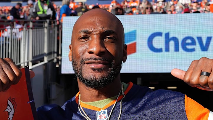 Nov 17, 2024; Denver, Colorado, USA; Retired American football player Aqib Talib during the second quarter between the Atlanta Falcons against the Denver Broncos at Empower Field at Mile High. Mandatory Credit: Ron Chenoy-Imagn Images