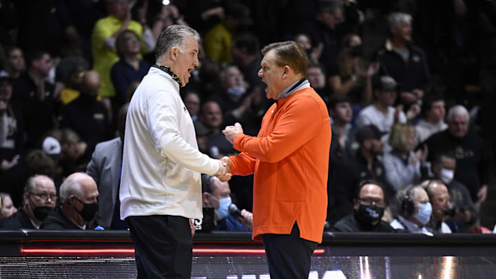 Feb 8, 2022; West Lafayette, Indiana, USA; Purdue Boilermakers head coach Matt Painter and Illinois Fighting Illini head coach Brad Underwood talk after the game at Mackey Arena. Boilermakers won 84-68. Mandatory Credit: Marc Lebryk-Imagn Images