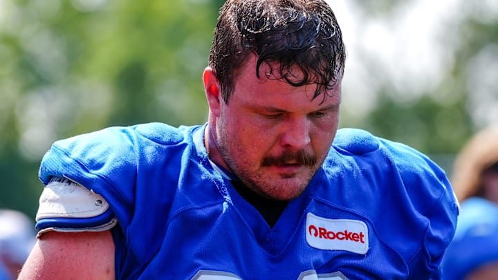 Detroit Lions OL Graham Glasgow walks off the field at the end of the joint practice with the Miami Dolphins at the Lions headquarters and training facility in Allen Park, Thursday, Aug. 14 2025