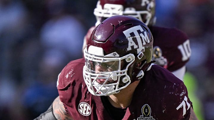 Dec 20, 2025; College Station, TX, USA; Texas A&M Aggies offensive lineman Chase Bisontis (71) blocks the rush during the game between the Aggies and the Hurricanes at Kyle Field. 