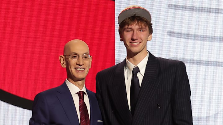 Jun 26, 2024; Brooklyn, NY, USA; Matas Buzelis poses for photos with NBA commissioner Adam Silver after being selected in the first round by the Chicago Bulls in the 2024 NBA Draft at Barclays Center. Mandatory Credit: Brad Penner-Imagn Images