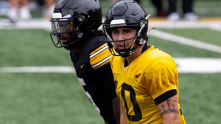 Iowa quarterback Jeremy Hecklinski (10) readies for the snap Aug. 15, 2026 during the Kids Day at Kinnick open practice at Kinnick Stadium in Iowa City, Iowa. Iowa quarterback Jeremy Hecklinski (10) readies for the snap Aug. 15, 2026 during the Kids Day at Kinnick open practice at Kinnick Stadium in Iowa City, Iowa.