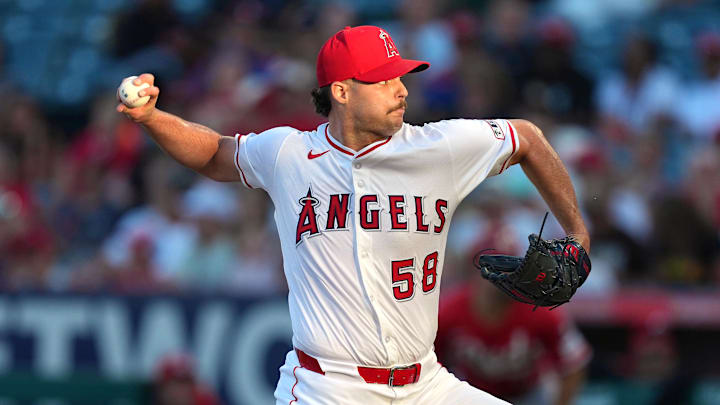 Los Angeles Angels relief pitcher Victor Mederos (58) throws Los Angeles Angels relief pitcher Victor Mederos (58) throws