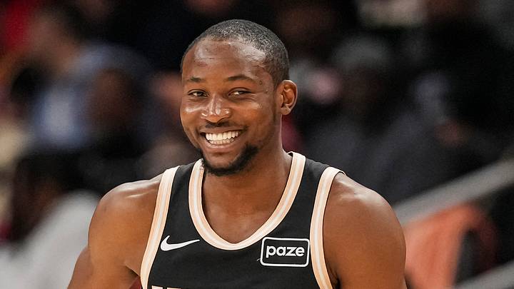 Atlanta Hawks forward Jonathan Kuminga (0) reacts after making a three point shot against the Washington Wizards during the first half at State Farm Arena on February 26, 2026.