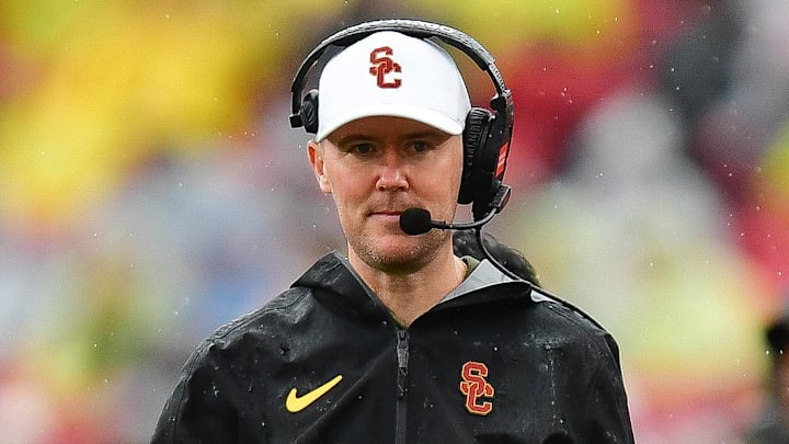 Nov 15, 2025; Los Angeles, California, USA; Southern California Trojans head coach Lincoln Riley watches game action against the Iowa Hawkeyes during the first half at the Los Angeles Memorial Coliseum. Mandatory Credit: Gary A. Vasquez-Imagn Images