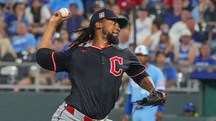 Jul 26, 2025; Kansas City, Missouri, USA; Cleveland Guardians relief pitcher Emmanuel Clase (48) delivers a pitch against the Kansas City Royals in the ninth inning at Kauffman Stadium. Mandatory Credit: Denny Medley-Imagn Images