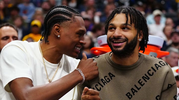 Apr 10, 2026; Denver, Colorado, USA; Denver Nuggets guard Peyton Watson (8) and guard Jamal Murray (27) react in the second half against the Oklahoma City Thunder at Ball Arena. Mandatory Credit: Ron Chenoy-Imagn Images