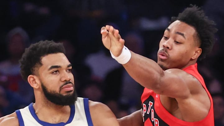 New York Knicks center Karl-Anthony Towns is guarded by Toronto Raptors forward Scottie Barnes New York Knicks center Karl-Anthony Towns is guarded by Toronto Raptors forward Scottie Barnes