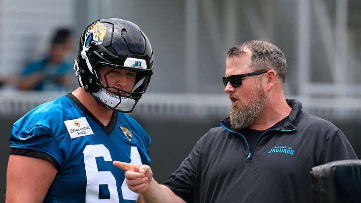 Jacksonville Jaguars guard Wyatt Milum (64) listens to offensive line coach Shaun Sarrett during a rookie minicamp at Miller Electric Center Saturday, May 10, 2025 in Jacksonville, Fla. [Corey Perrine/Florida Times-Union]