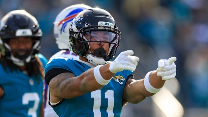Jacksonville Jaguars wide receiver Parker Washington (11) celebrates his first down pickup during the third quarter of an NFL football AFC Wild Card playoff matchup, Sunday, Jan. 11, 2026, in Jacksonville, Fla. The Bills defeated the Jaguars 27-24. [Corey Perrine/Florida Times-Union]