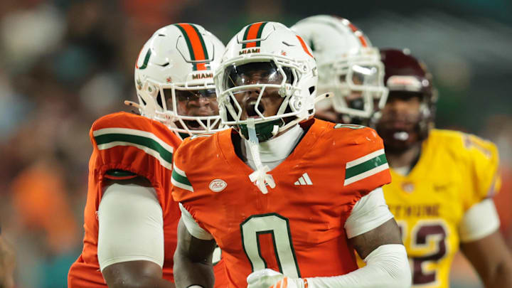 Sep 6, 2025; Miami Gardens, Florida, USA; Miami Hurricanes defensive back Keionte Scott (0) reacts after a play against the Bethune-Cookman Wildcats during the third quarter at Hard Rock Stadium. Mandatory Credit: Sam Navarro-Imagn Images