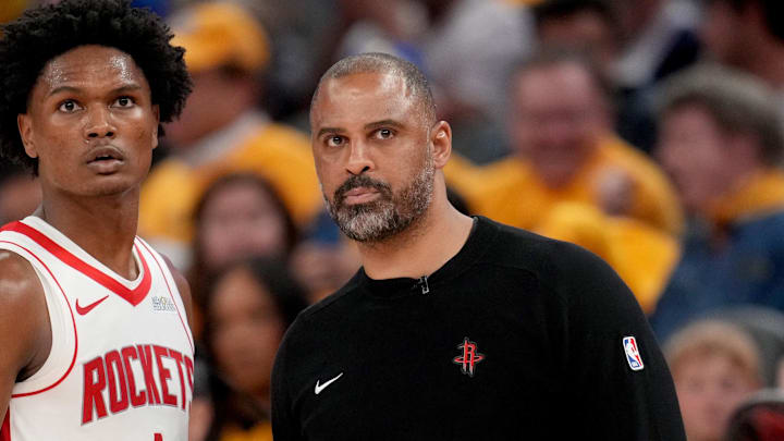 May 2, 2025; San Francisco, California, USA; Houston Rockets forward Amen Thompson (1) meets with Houston Rockets head coach Ime Udoka during a break in the action against the Golden State Warriors in the fourth quarter of game six of the first round for the 2025 NBA Playoffs at Chase Center. Mandatory Credit: Cary Edmondson-Imagn Images