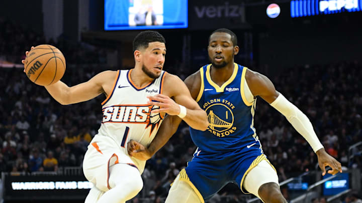 Nov 4, 2025; San Francisco, California, USA; Phoenix Suns guard Devin Booker (1) drives to the basket against Golden State Warriors forward Jonathan Kuminga (1) in the second quarter at Chase Center. Mandatory Credit: Eakin Howard-Imagn Images Nov 4, 2025; San Francisco, California, USA; Phoenix Suns guard Devin Booker (1) drives to the basket against Golden State Warriors forward Jonathan Kuminga (1) in the second quarter at Chase Center. Mandatory Credit: Eakin Howard-Imagn Images