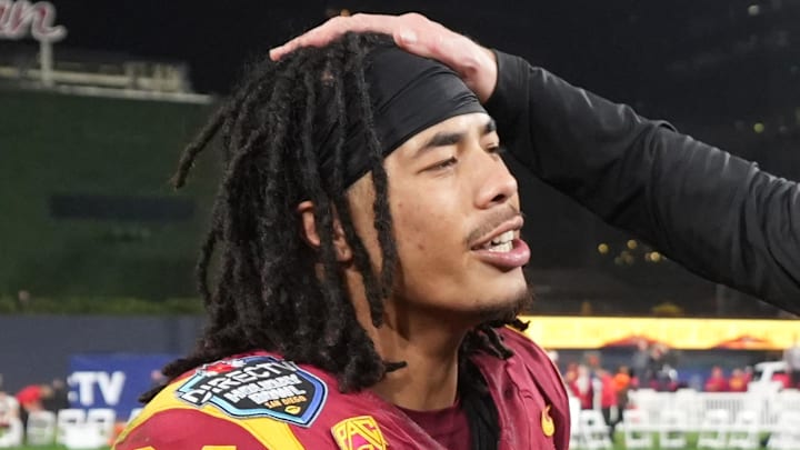Dec 27, 2023; San Diego, CA, USA; Southern California Trojans head coach Lincoln Riley (right) celebrates with wide receiver Makai Lemon (24) after the Holiday Bowl against the Louisville Cardinals at Petco Park. Mandatory Credit: Kirby Lee-Imagn Images