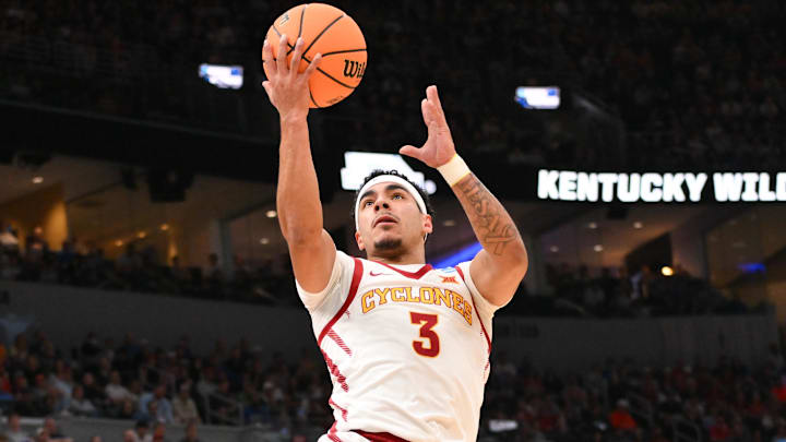 Mar 22, 2026; St. Louis, MO, USA; Iowa State Cyclones guard Tamin Lipsey (3) drives to the basket for a lay up as Kentucky Wildcats guard Collin Chandler (5) defends during the first half during a second round game of the men's 2026 NCAA Tournament at Enterprise Center.