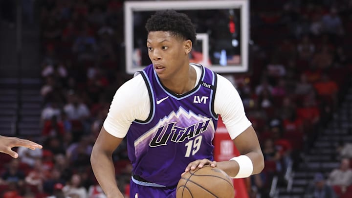 Oct 8, 2025; Houston, Texas, USA; /Utah Jazz forward Ace Bailey (19) dribbles the ball as Houston Rockets forward Jabari Smith Jr. (10) defends during the second quarter at Toyota Center. Mandatory Credit: Troy Taormina-Imagn Images