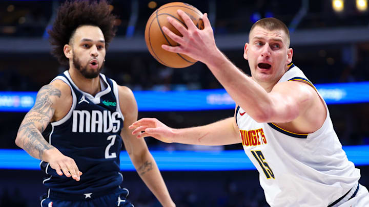 Mar 17, 2024; Dallas, Texas, USA; Denver Nuggets center Nikola Jokic (15) grabs the ball in front of Dallas Mavericks center Dereck Lively II (2) during the first quarter at American Airlines Center. Mandatory Credit: Kevin Jairaj-Imagn Images Mar 17, 2024; Dallas, Texas, USA; Denver Nuggets center Nikola Jokic (15) grabs the ball in front of Dallas Mavericks center Dereck Lively II (2) during the first quarter at American Airlines Center. Mandatory Credit: Kevin Jairaj-Imagn Images