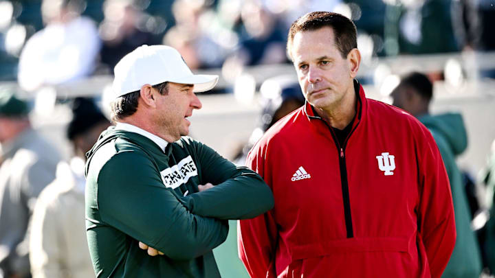 Michigan State's head coach Jonathan Smith, left, talks with Indiana's head coach Curt Cignetti before the game on Saturday, Nov. 2, 2024, at Spartan Stadium in East Lansing.