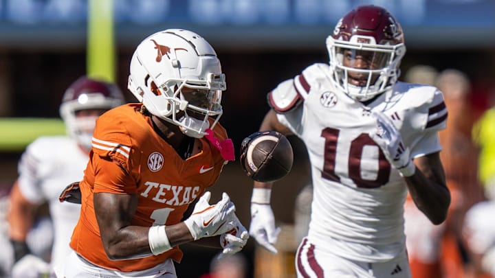 Texas Longhorns wide receiver Johntay Cook II (1) reaches out his hands to catch a pass against Mississippi State at Darrell K Royal-Texas Memorial Stadium in Austin, Texas. Texas Longhorns wide receiver Johntay Cook II (1) reaches out his hands to catch a pass against Mississippi State at Darrell K Royal-Texas Memorial Stadium in Austin, Texas.