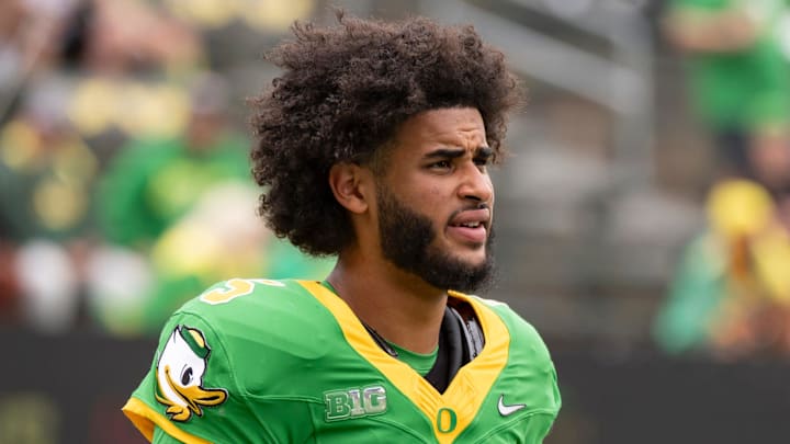 Oregon quarterback Dante Moore warms up as the Oregon Ducks host the Oklahoma State Cowboys on Sept. 6, 2025, at Autzen Stadium in Eugene, Oregon.