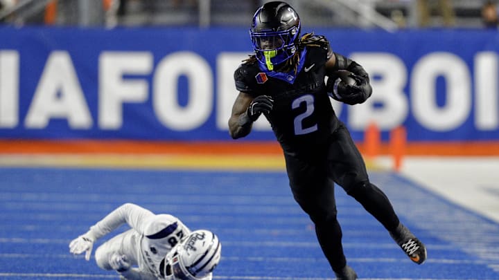 Nov 9, 2024; Boise, Idaho, USA; Boise State Broncos running back Ashton Jeanty (2) runs the ball against the Nevada Wolf Pack during the second half at Albertsons Stadium. Boise State won 28-21.  Mandatory Credit: Brian Losness-Imagn Images

