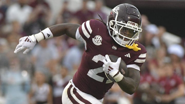 Mississippi State Bulldogs running back Davon Booth (21) runs the ball against the Massachusetts Minutemen during the third quarter at Davis Wade Stadium at Scott Field.