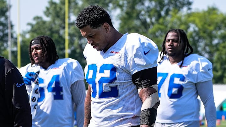 Detroit Lions defensive end Marcus Davenport (92), center, walk offs the field after practice during training camp Detroit Lions defensive end Marcus Davenport (92), center, walk offs the field after practice during training camp