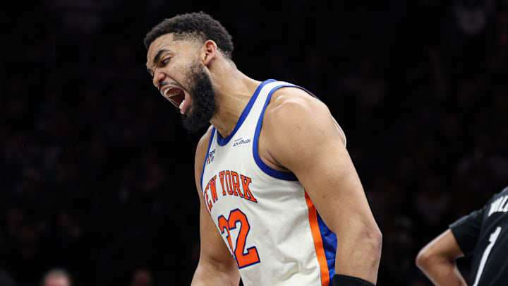 Mar 20, 2026; Brooklyn, New York, USA; New York Knicks center Karl-Anthony Towns (32) reacts after a basket during the first half against the Brooklyn Nets at Barclays Center. Mandatory Credit: Vincent Carchietta-Imagn Images
