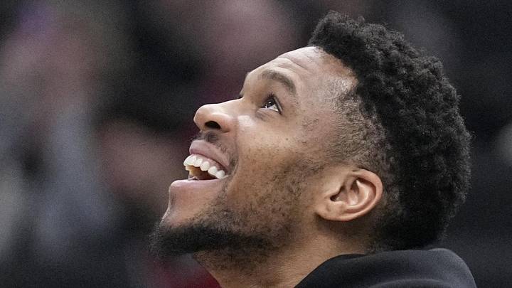Milwaukee Bucks forward Giannis Antetokounmpo (34) claps as his brother, Milwaukee Bucks forward Alex Antetokounmpo (29), not pictured, scores on a made basket against the Memphis Grizzlies in the second half at Fiserv Forum. on April 5, 2026.