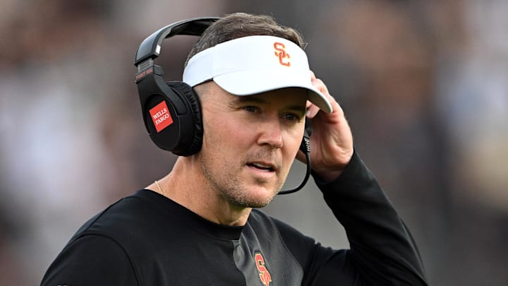 Sep 13, 2025; West Lafayette, Indiana, USA; Southern California Trojans head coach Lincoln Riley stands on the sidelines during the first quarter against the Purdue Boilermakers at Ross-Ade Stadium. Mandatory Credit: Marc Lebryk-Imagn Images