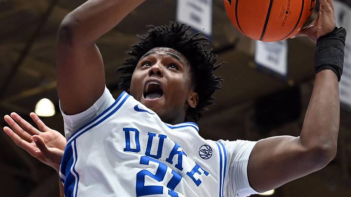 Feb 14, 2026; Durham, North Carolina, USA; Duke Blue Devils center Patrick Ngongba II (21) shoots over Clemson Tigers forward RJ Godfrey (0) during the second half at Cameron Indoor Stadium. Mandatory Credit: Rob Kinnan-Imagn Images Feb 14, 2026; Durham, North Carolina, USA; Duke Blue Devils center Patrick Ngongba II (21) shoots over Clemson Tigers forward RJ Godfrey (0) during the second half at Cameron Indoor Stadium. Mandatory Credit: Rob Kinnan-Imagn Images