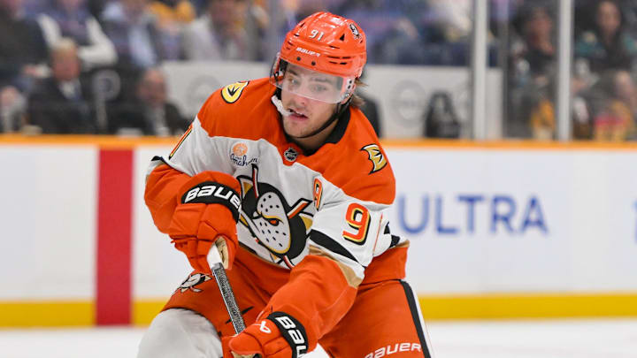 Oct 21, 2025; Nashville, Tennessee, USA;  Anaheim Ducks center Leo Carlsson (91) takes a shot on goal against the Nashville Predators during the second period at Bridgestone Arena. Mandatory Credit: Steve Roberts-Imagn Images