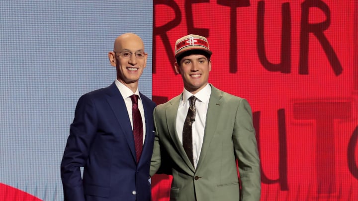 Jun 26, 2024; Brooklyn, NY, USA; Reed Sheppard poses for photos with NBA commissioner Adam Silver after being selected third overall by the Houston Rockets in the first round of the 2024 NBA Draft at Barclays Center. Mandatory Credit: Brad Penner-USA TODAY Sports