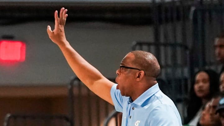 North Carolina Tar Heels head coach Hubert Davis communicates with his team during the first half of the Fort Myers Tip-Off Beach Division game against the Michigan State Spartans at Suncoast Credit Union Arena on Fort Myers, Fla., on Thursday, Nov. 27, 2025.