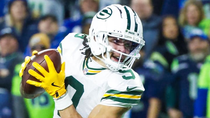 Green Bay Packers wide receiver Christian Watson (9) catches a pass against the Seattle Seahawks last season.