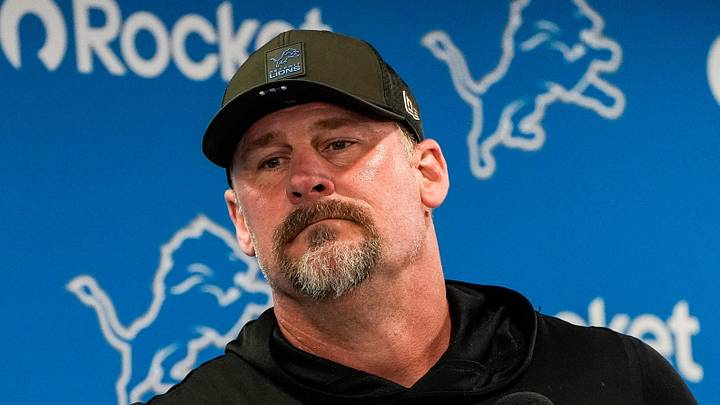 Detroit Lions head coach Dan Campbell answers a question.