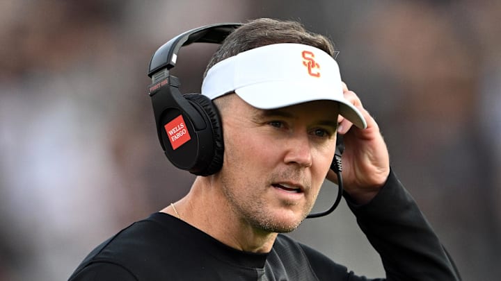 Sep 13, 2025; West Lafayette, Indiana, USA; Southern California Trojans head coach Lincoln Riley stands on the sidelines during the first quarter against the Purdue Boilermakers at Ross-Ade Stadium. Mandatory Credit: Marc Lebryk-Imagn Images