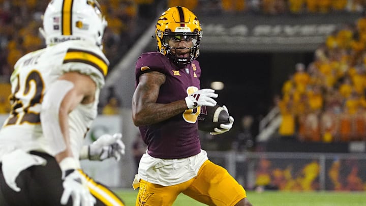 ASU wide receiver Jordyn Tyson (0) runs downfield against Wyoming during a game at Sun Devil Stadium.