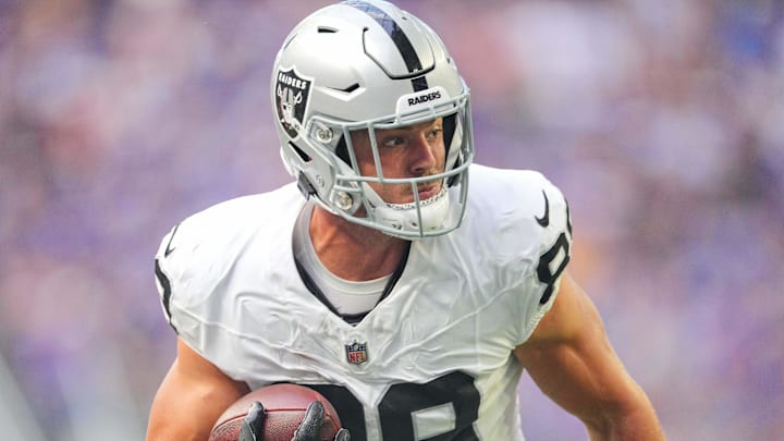 Aug 10, 2024; Minneapolis, Minnesota, USA; Las Vegas Raiders tight end Brock Bowers (89) runs after the catch against the Minnesota Vikings in the first quarter at U.S. Bank Stadium. Mandatory Credit: Brad Rempel-Imagn Images