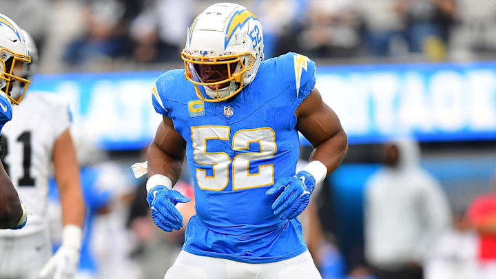 Oct 1, 2023; Inglewood, California, USA; Los Angeles Chargers linebacker Khalil Mack (52) reacts after sacking Las Vegas Raiders quarterback Aidan O'Connell (4) with defensive tackle Sebastian Joseph-Day (51) during the second half at SoFi Stadium. Mandatory Credit: Gary A. Vasquez-Imagn Images Oct 1, 2023; Inglewood, California, USA; Los Angeles Chargers linebacker Khalil Mack (52) reacts after sacking Las Vegas Raiders quarterback Aidan O'Connell (4) with defensive tackle Sebastian Joseph-Day (51) during the second half at SoFi Stadium. Mandatory Credit: Gary A. Vasquez-Imagn Images