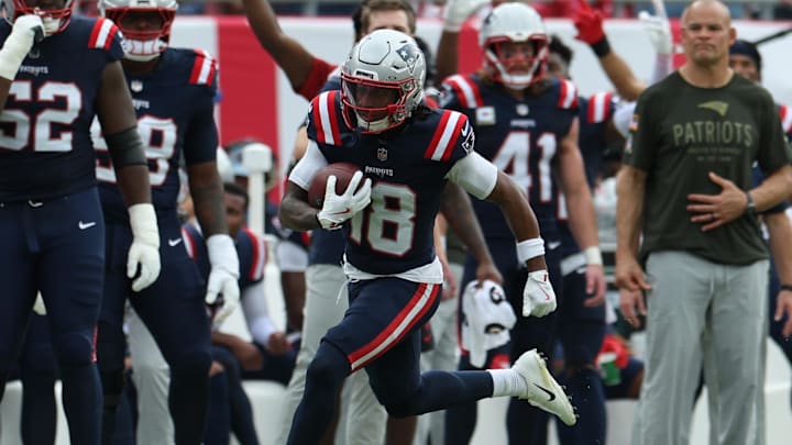 Nov 9, 2025; Tampa, Florida, USA; New England Patriots wide receiver Kyle Williams (18) runs for a touchdown during the second quarter against the Tampa Bay Buccaneers at Raymond James Stadium. Mandatory Credit: Nathan Ray Seebeck-Imagn Images Nov 9, 2025; Tampa, Florida, USA; New England Patriots wide receiver Kyle Williams (18) runs for a touchdown during the second quarter against the Tampa Bay Buccaneers at Raymond James Stadium. Mandatory Credit: Nathan Ray Seebeck-Imagn Images