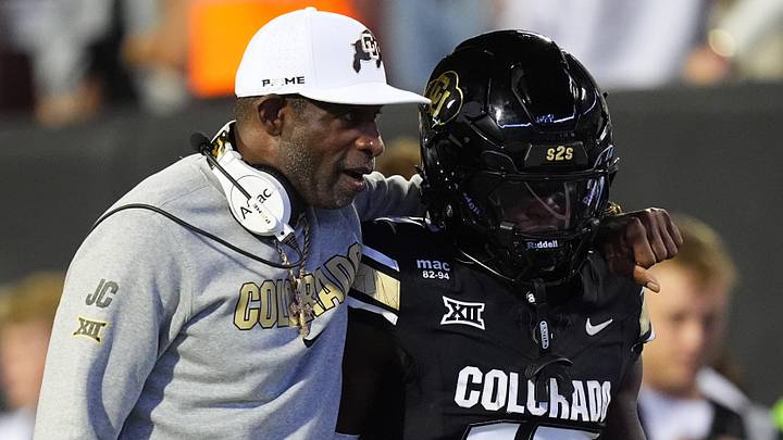 Sep 20, 2025; Boulder, Colorado, USA; Colorado Buffaloes head coach Deion Sanders and wide receiver Isaiah Hardge (17) during the first quarter against the Wyoming Cowboys at Folsom Field. Mandatory Credit: Ron Chenoy-Imagn Images Sep 20, 2025; Boulder, Colorado, USA; Colorado Buffaloes head coach Deion Sanders and wide receiver Isaiah Hardge (17) during the first quarter against the Wyoming Cowboys at Folsom Field. Mandatory Credit: Ron Chenoy-Imagn Images