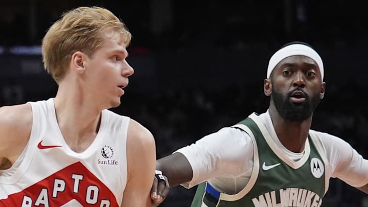 Toronto Raptors guard Gradey Dick drives to the net against Milwaukee Bucks forward Bobby Portis. Toronto Raptors guard Gradey Dick drives to the net against Milwaukee Bucks forward Bobby Portis.