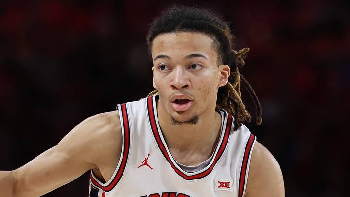 Houston Cougars guard Kingston Flemings (4) dribbles against Baylor Bears in the first half at Fertitta Center on March 4, 2026