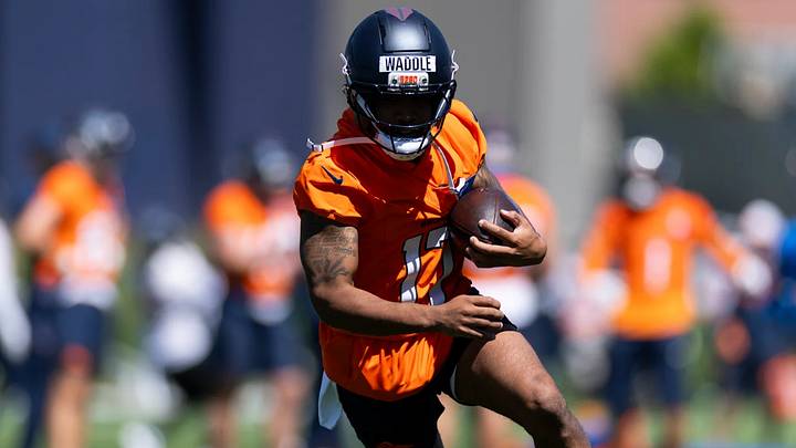 Denver Broncos wide receiver Jaylen Waddle catches a pass during OTA practice at Broncos Park Powered by CommonSpirit.