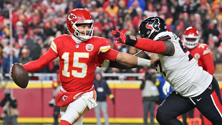 Dec 7, 2025; Kansas City, Missouri, USA; Kansas City Chiefs quarterback Patrick Mahomes (15) is pressured by Houston Texans defensive tackle Mario Edwards Jr. (97) during the second quarter at GEHA Field at Arrowhead Stadium. Dec 7, 2025; Kansas City, Missouri, USA; Kansas City Chiefs quarterback Patrick Mahomes (15) is pressured by Houston Texans defensive tackle Mario Edwards Jr. (97) during the second quarter at GEHA Field at Arrowhead Stadium.