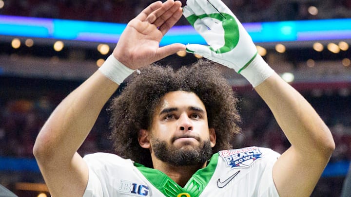 Oregon quarterback Dante Moore walks off the field as the Oregon Ducks face the Indiana Hoosiers in the Peach Bowl on Jan. 9, 2026, at Mercedes-Benz Stadium in Atlanta, Georgia.
