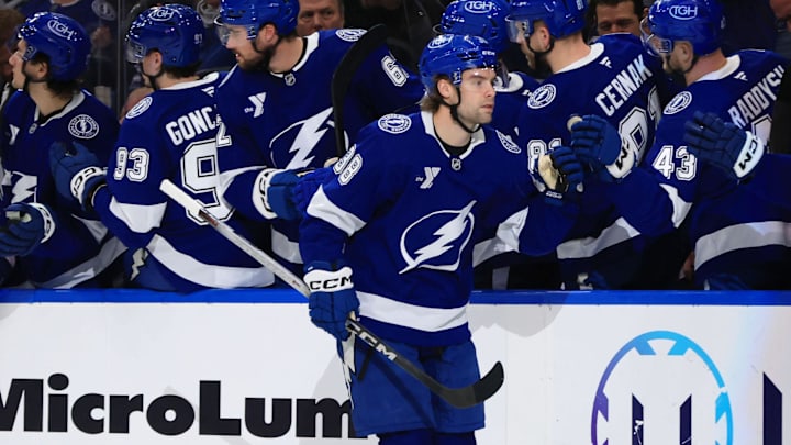 Jan 20, 2026; Tampa, Florida, USA; Tampa Bay Lightning left wing Brandon Hagel (38) is congratulated after he scored a goal against the San Jose Sharks during the second period at Benchmark International Arena. Mandatory Credit: Kim Klement Neitzel-Imagn Images