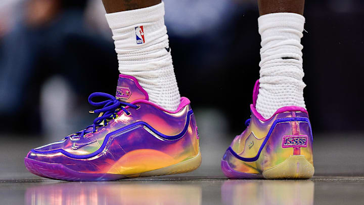 Los Angeles Lakers forward LeBron James wears the Nike LeBron 23 "15,828+" colorway.